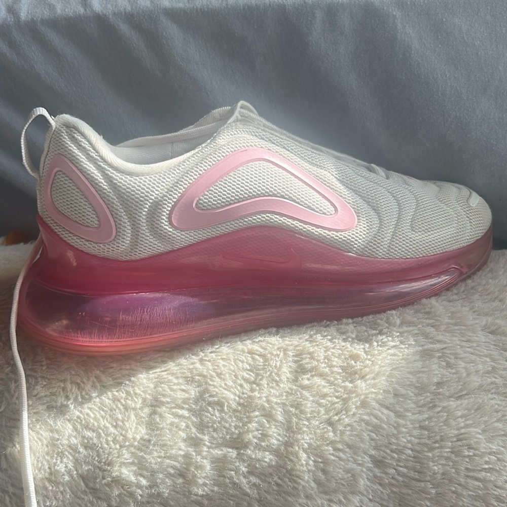Pink and white Nike air max shoes